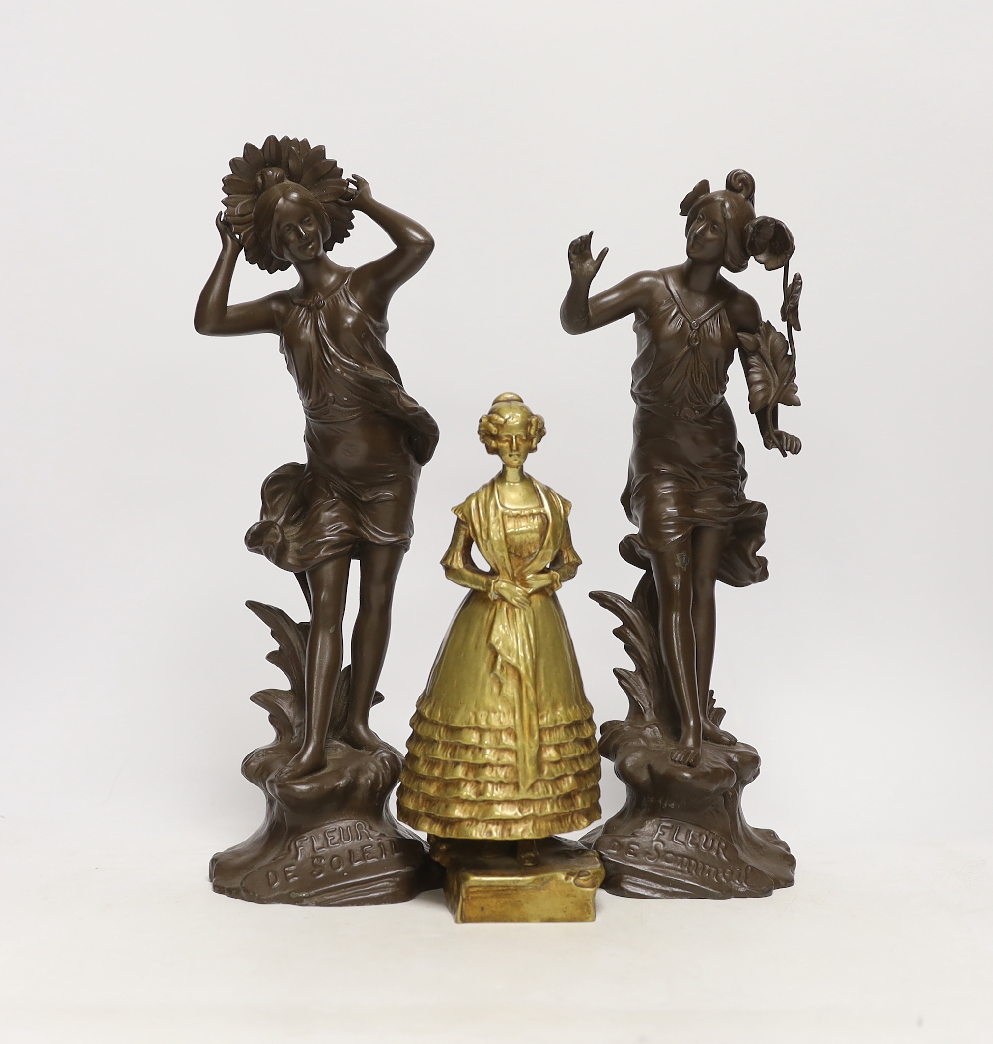 After Arthur Rubinstein, bronze study of a lady and a pair of French spelter figurines, largest 33cm high